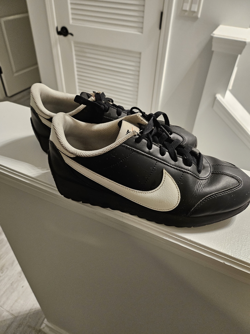 Nike Womens Black and Cream Retro Swoosh Sneaker
